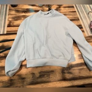 Light blue sweater